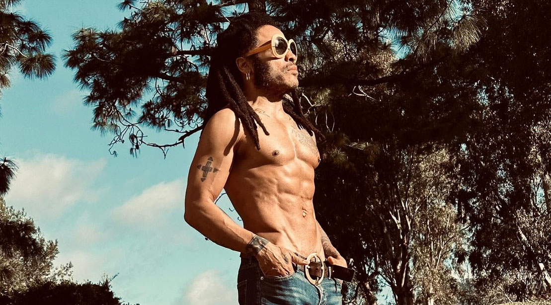 Lenny Kravitz showing his upper body physique outdoors